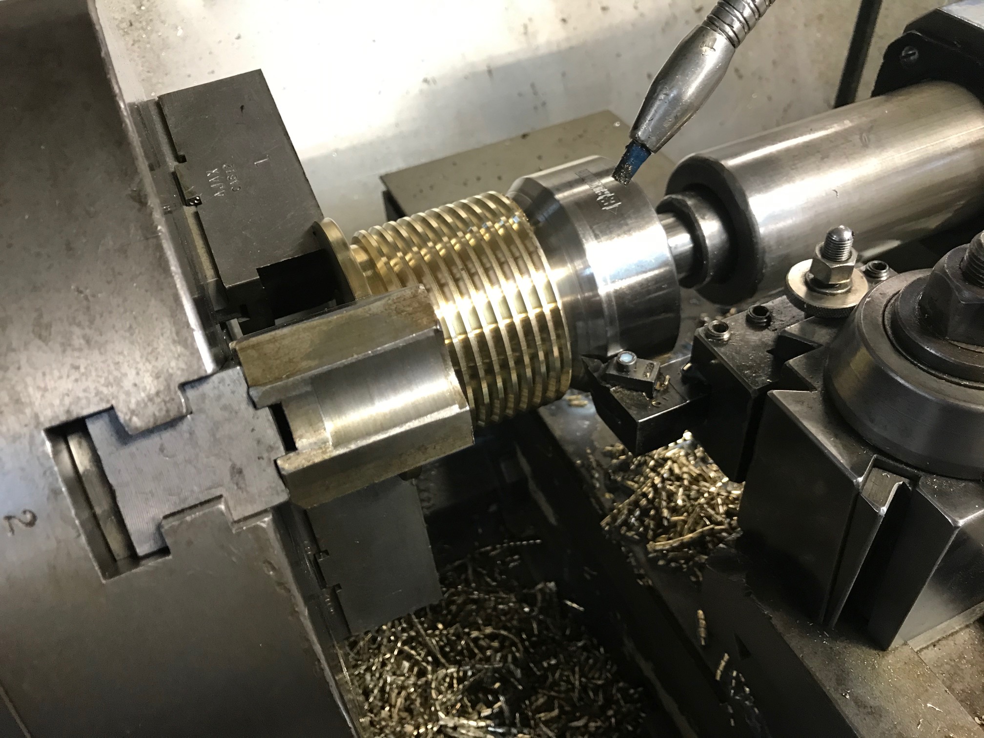 Turning and threading operation on a CNC lathe